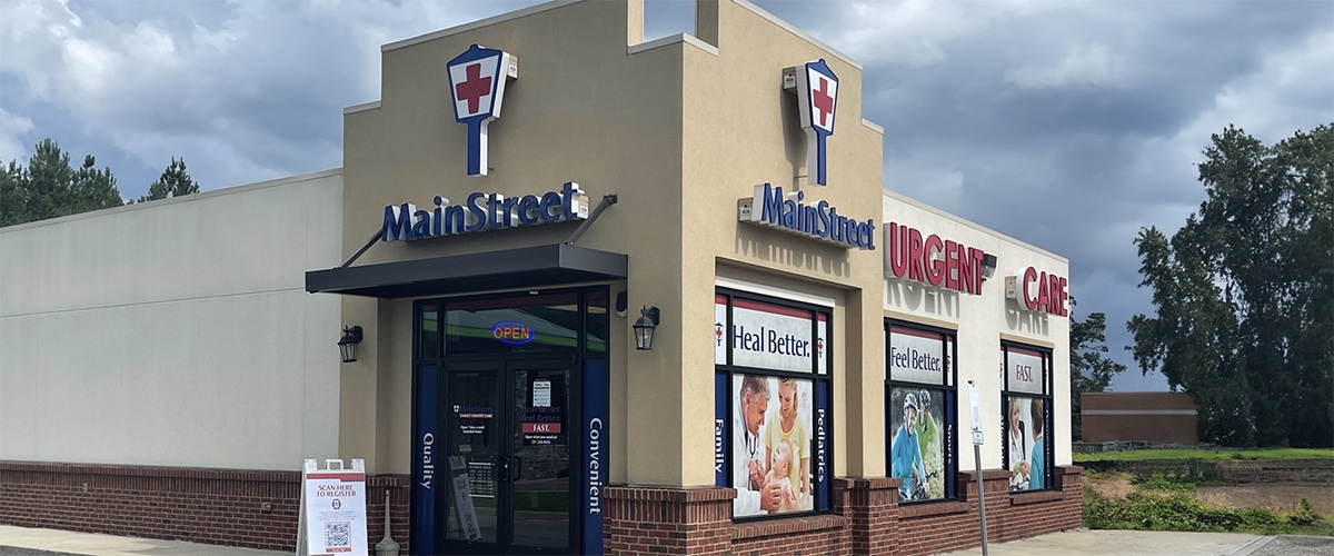 exterior image of MainStreet clinic entrance on sunny day